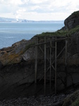 SX24914 Old wooden remains at lighthouse base.jpg